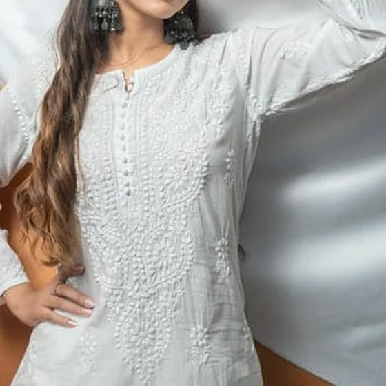 Close-up of floral chikankari embroidery on a mulmul cotton yoke